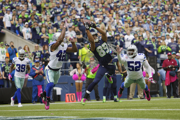 Murray leads Dallas past Seattle 30-23