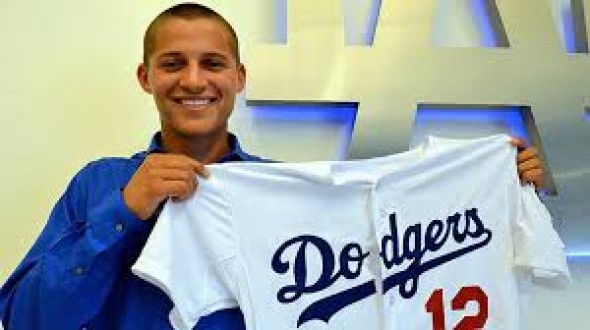 Corey Seager of the Los Angeles Dodgers smiles on the field during